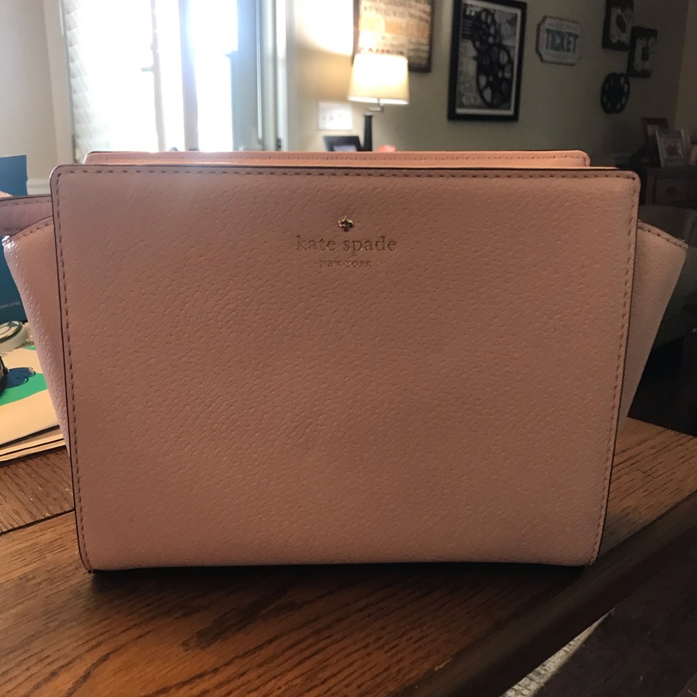 Kate spade crossbody. Light pink with gold accent.